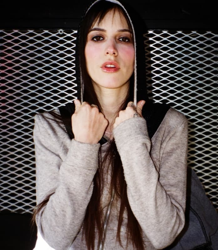 Oklou wearing Iseder for Paper Magazine